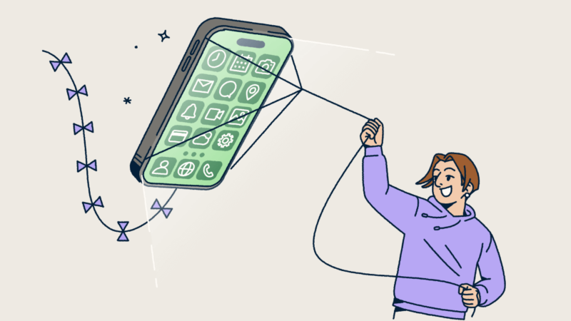 A person flying a mobile phone like a kite.