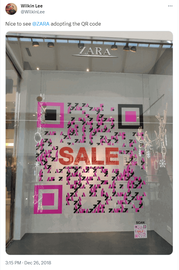 Screenshot of Zara’s magenta and black QR Code on their storefront window.